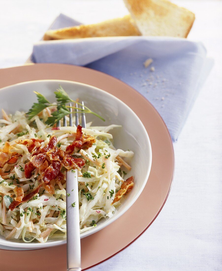 White cabbage salad with fried bacon and mayonnaise