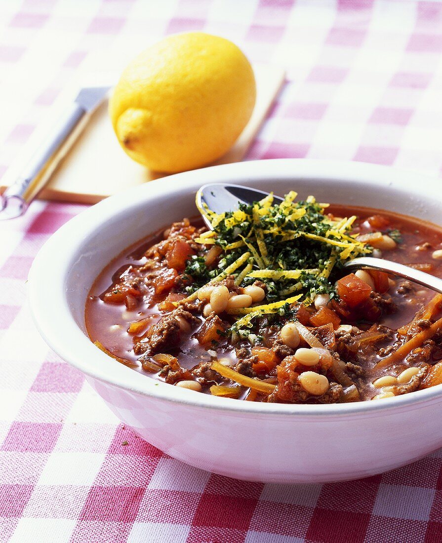 Mince sauce with white beans and gremolata