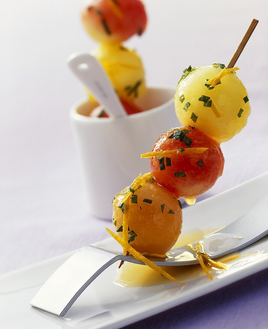 Marinated melon skewers