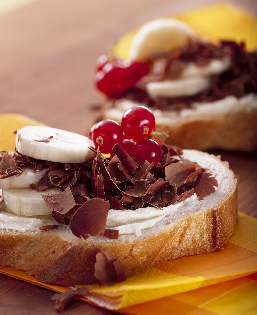 Banana slices and chocolate shavings on bread
