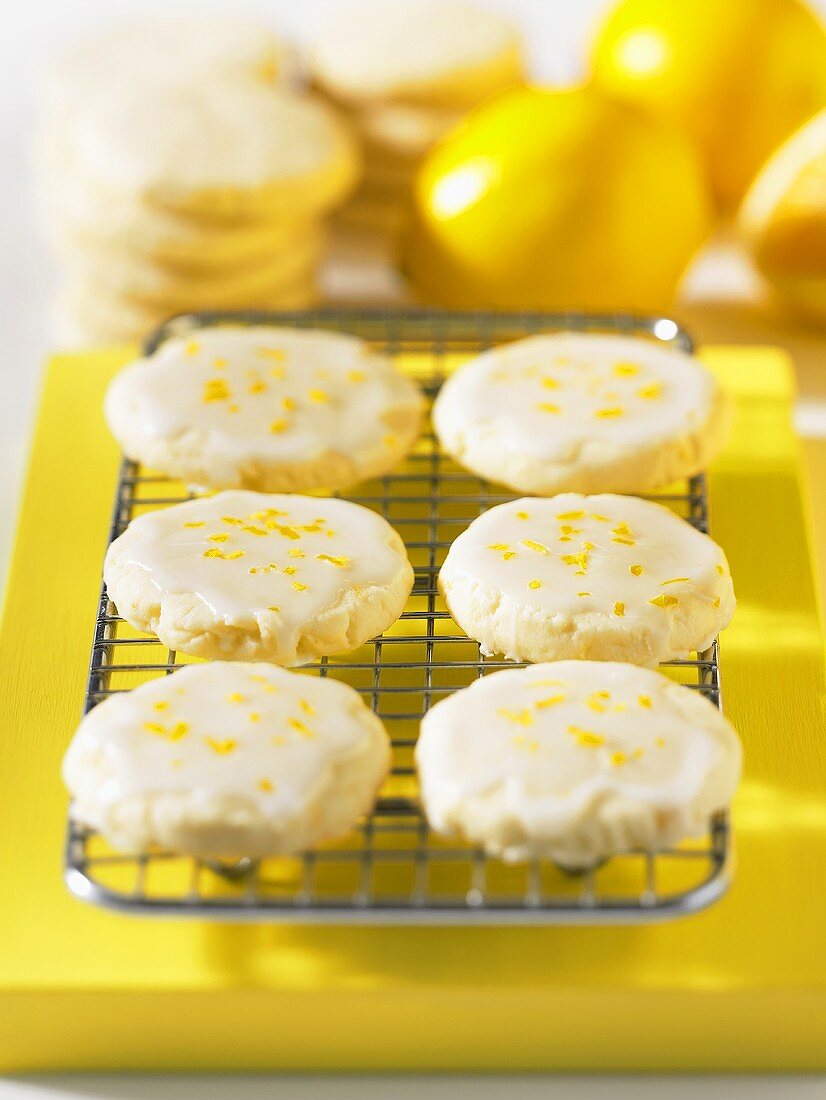 Biscuits with lemon icing on cake rack