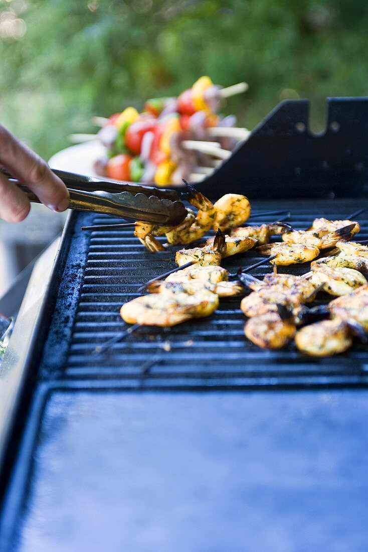 Prawn skewers on a barbecue