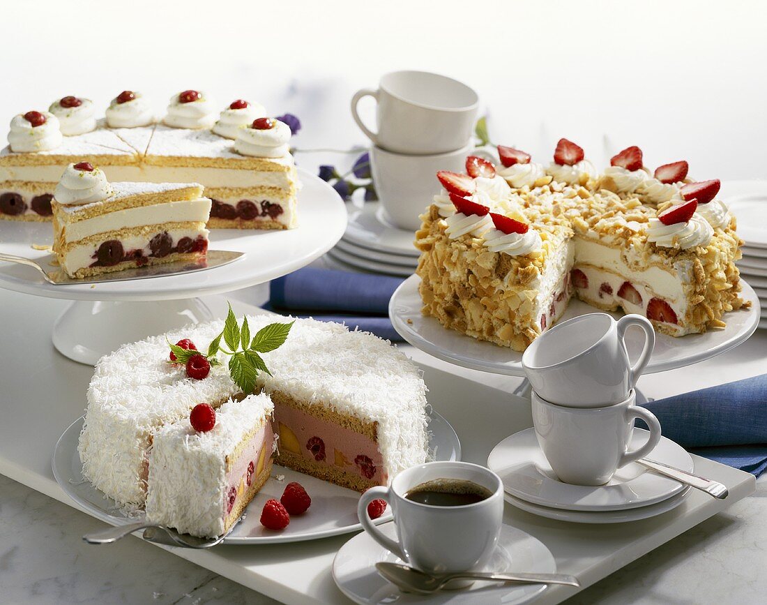 Three different fruit cream cakes to serve with coffee