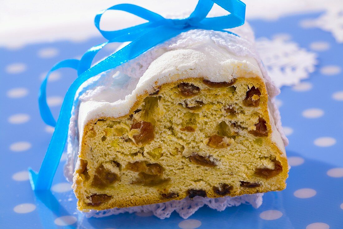 Christmas stollen with blue ribbon