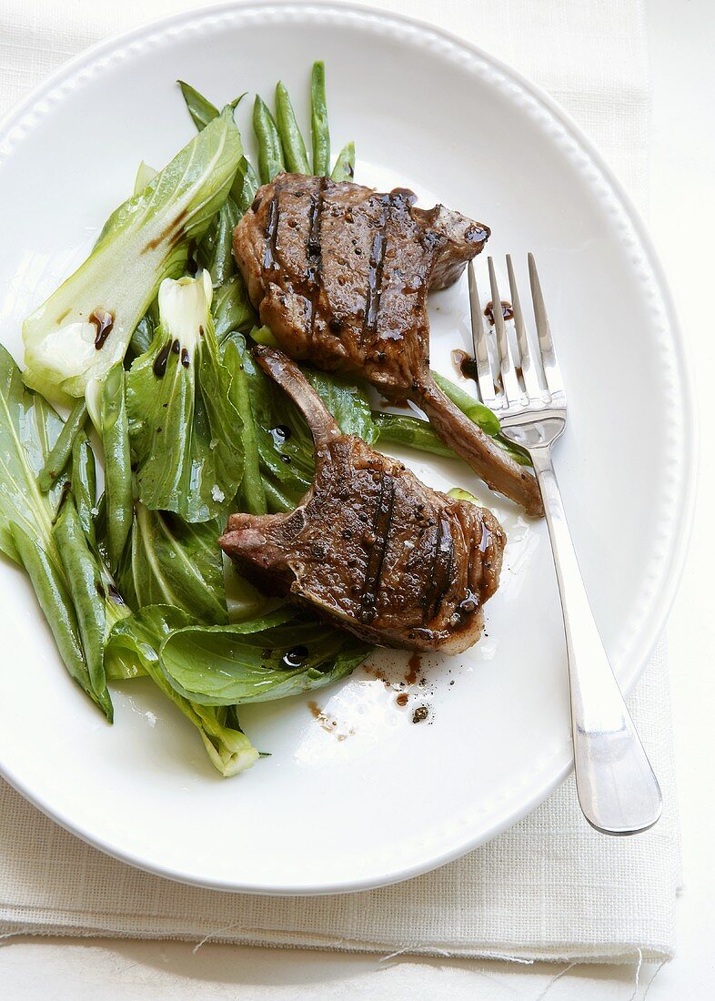 Lamb chops on pak choi