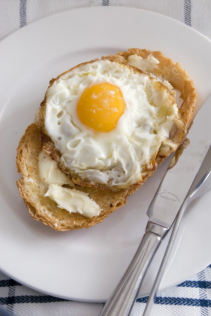 Fried egg on buttered toast (with sea salt butter)