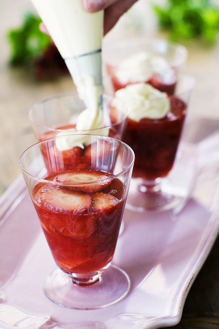 Strawberry and rhubarb dessert with cream