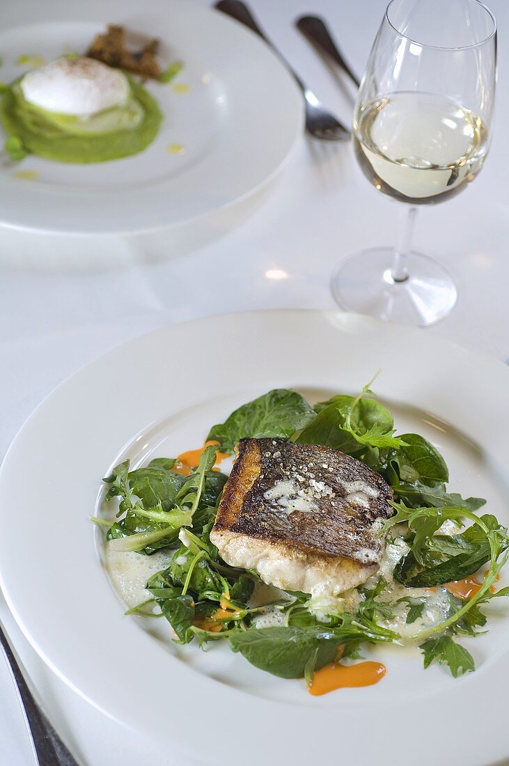 Sea bass with wild herbs and chilli oil