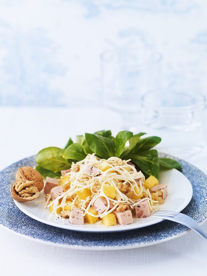 Celeriac salad with nuts, pineapple and meat terrine