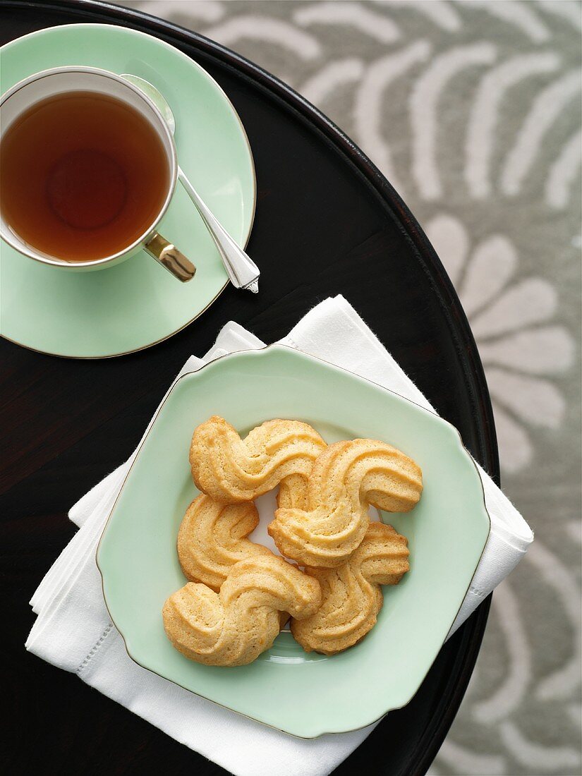 Piped biscuits with tea