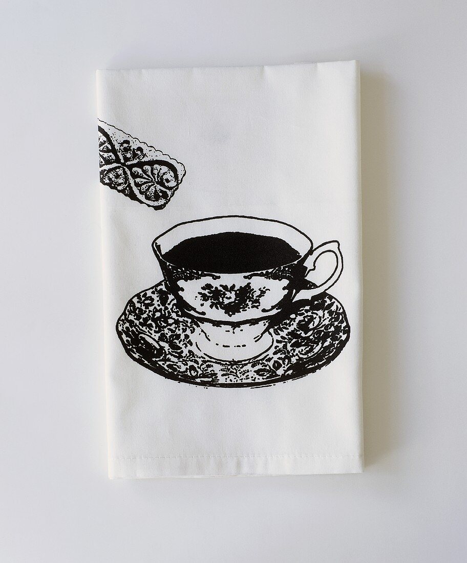 White paper napkin with printed design (cup of tea & biscuit)