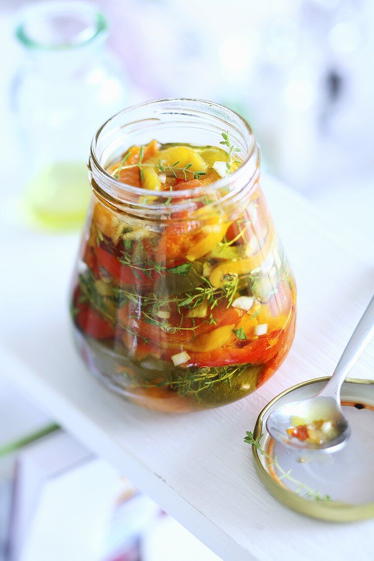 A jar of marinated peppers