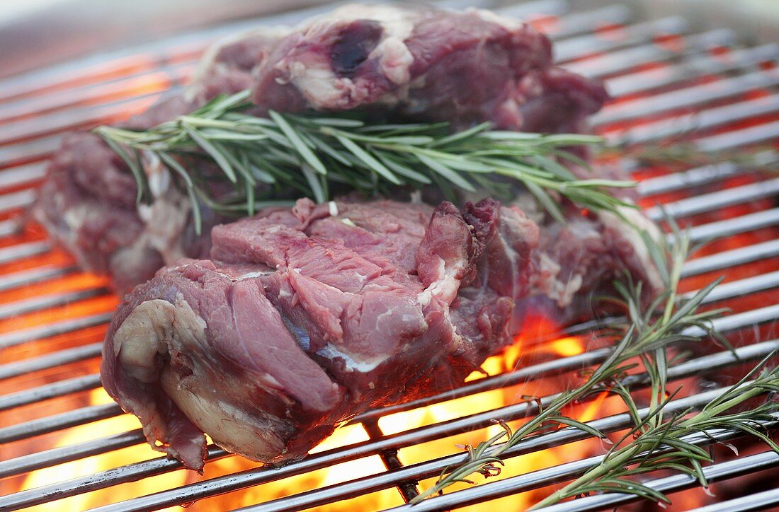 Leg of lamb with rosemary on the grill