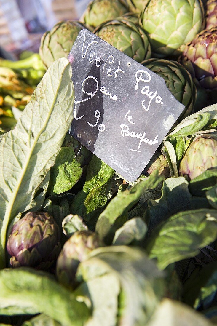 Artichokes at a market with a price label (Nice)