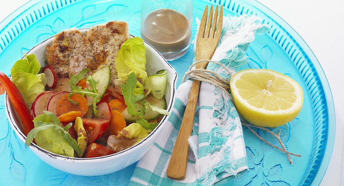 Mixed salad with a plain pork escalope