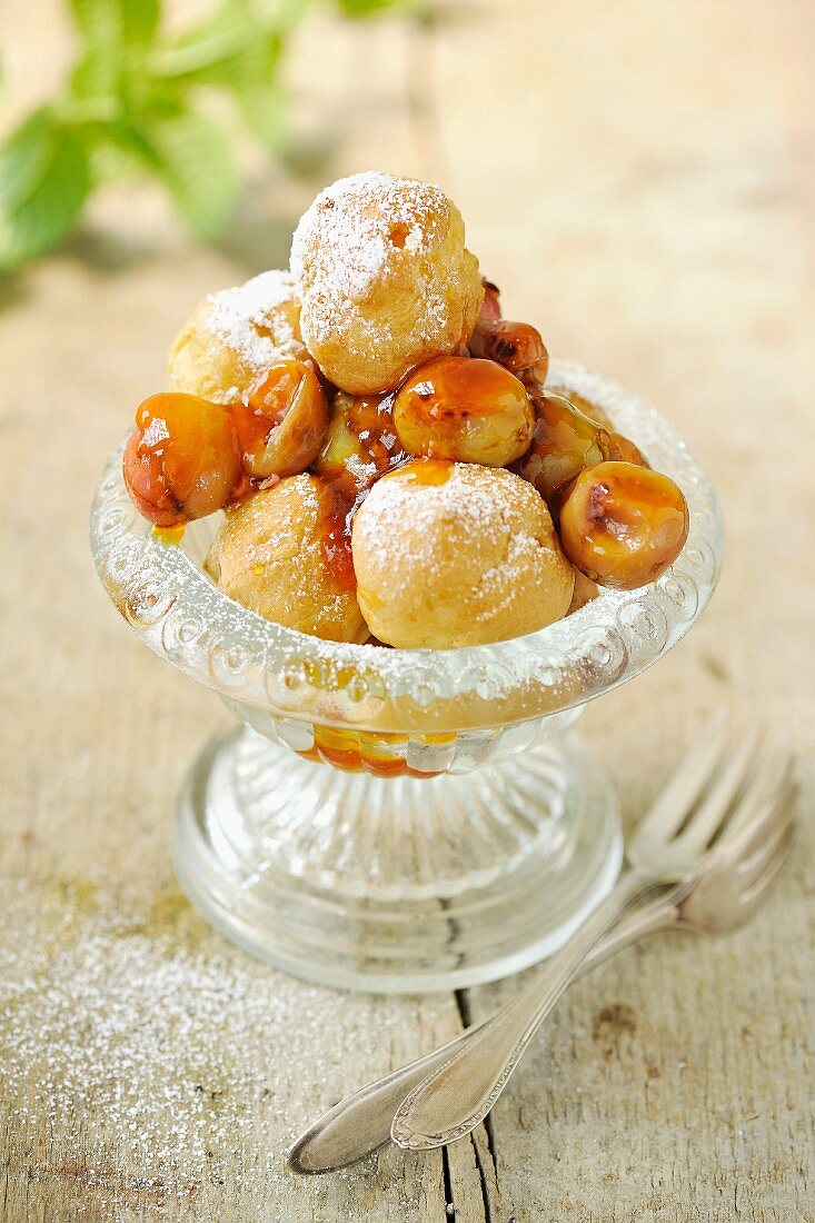 Mini profiteroles with gooseberry sauce