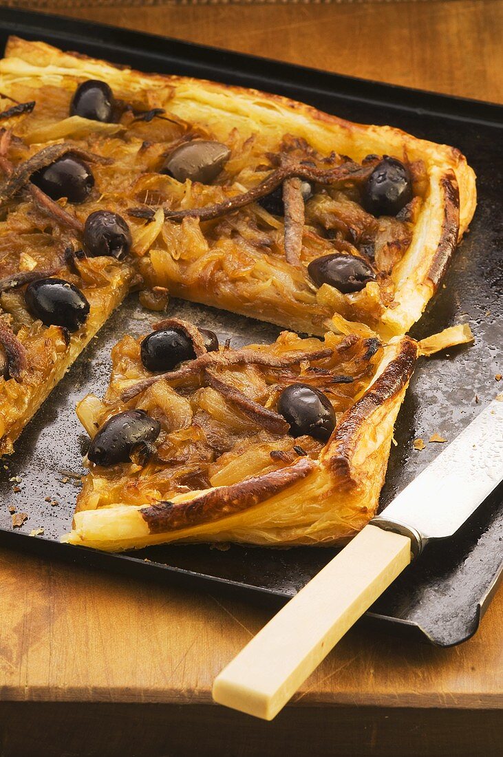 Onion tart with caramelised onions and olives