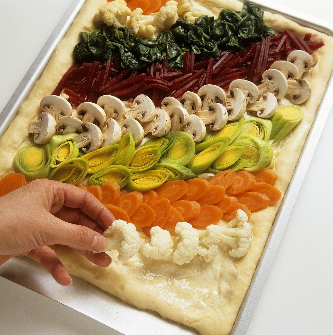 Arranging mixed vegetable flan