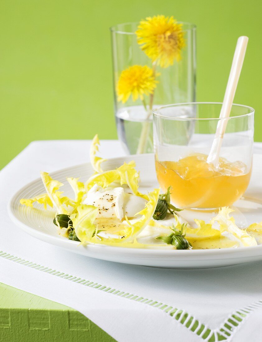 Dandelion salad with buffalo mozzarella and dandelion flower jelly