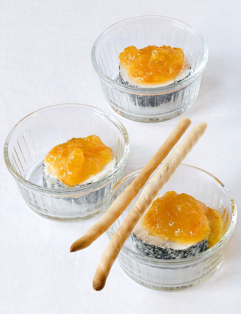 Goats' cream cheese with mandarin marmalade and grissini