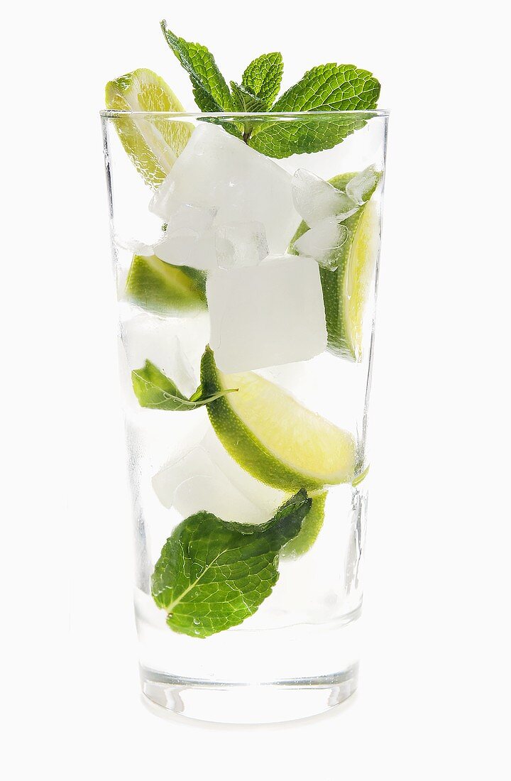 Mojito with lime slices and mint