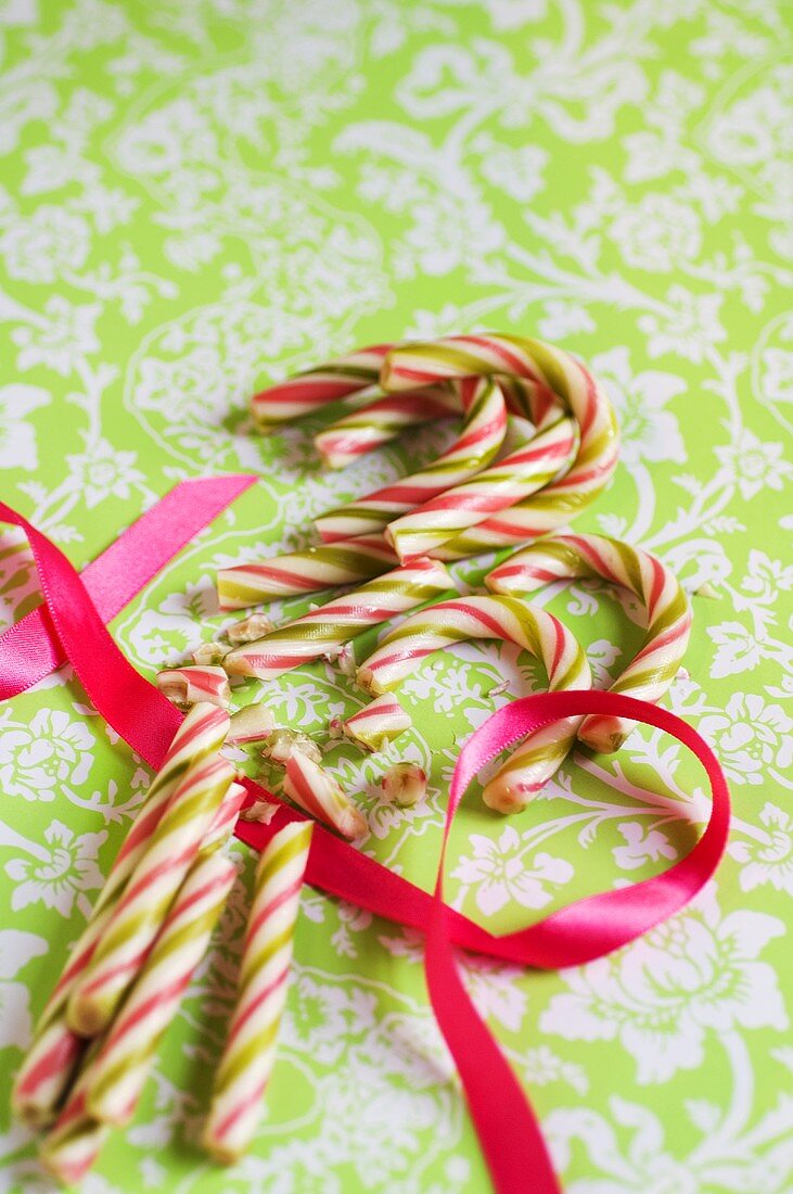 Broken candy canes with a red ribbon