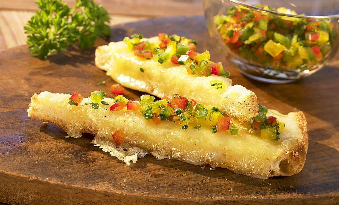 Grilled bread with cheese fondue and vegetable salsa
