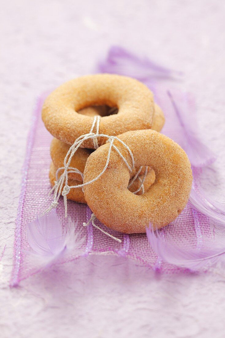 Ring-shaped cinnamon biscuits as Christmas tree decoration