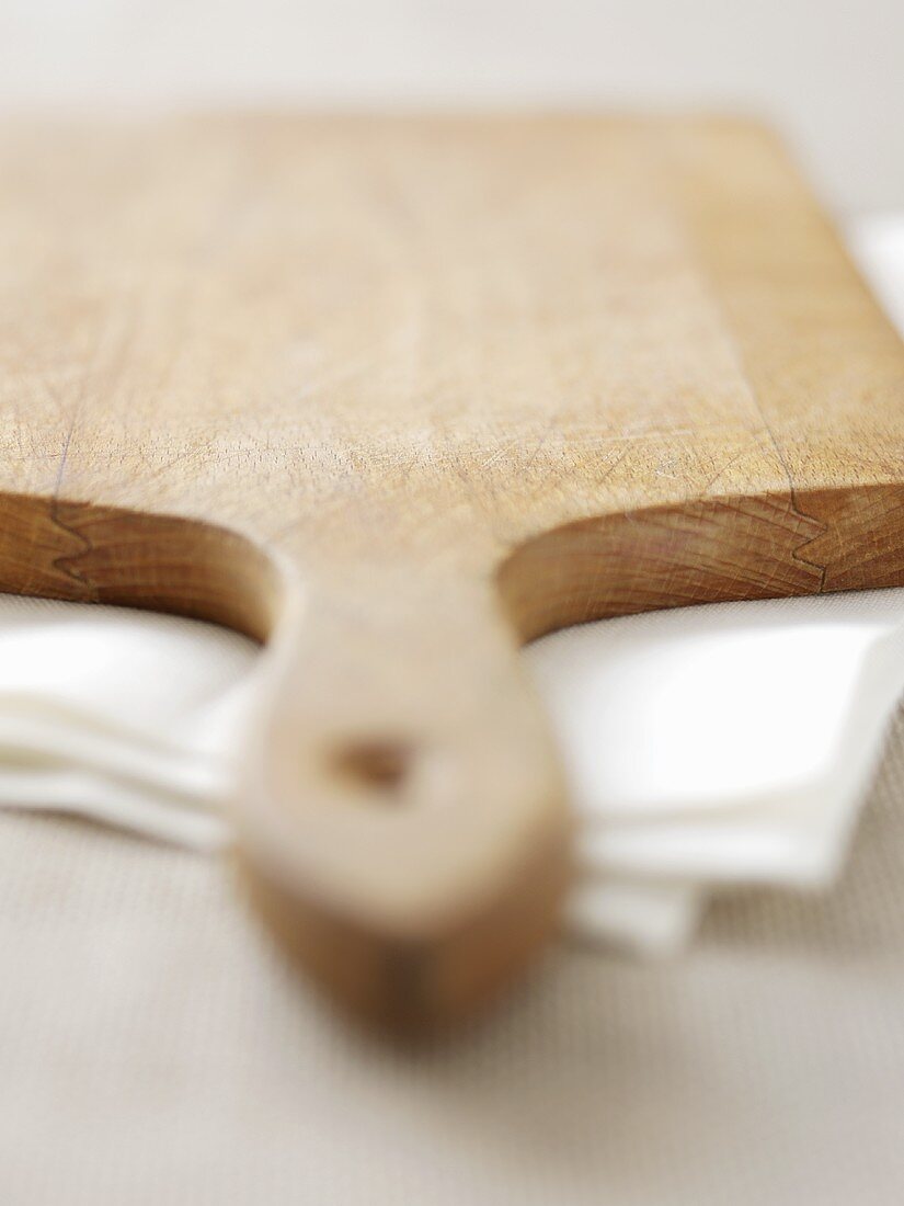 A wooden chopping board