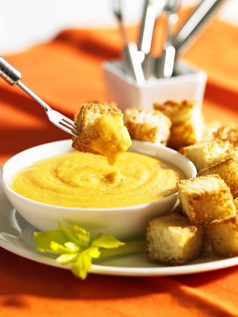 Cheddar dip with diced bread