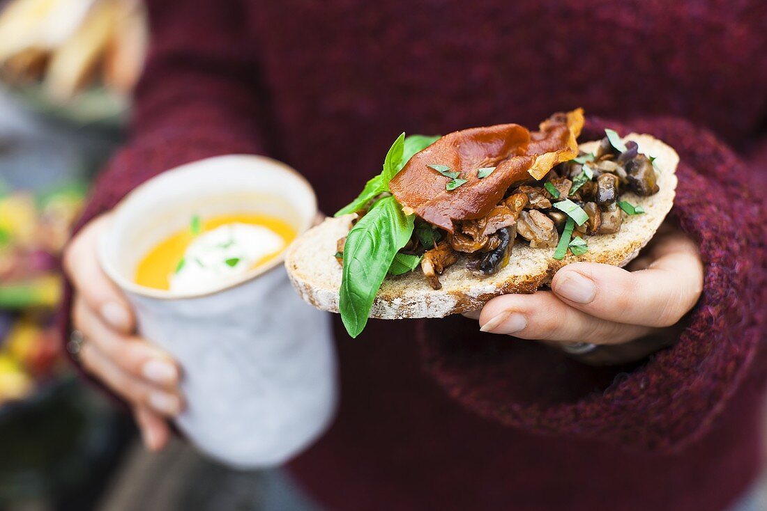 Toasted baguette with mushrooms and ham and arrot and orange soup with creamy horseradish