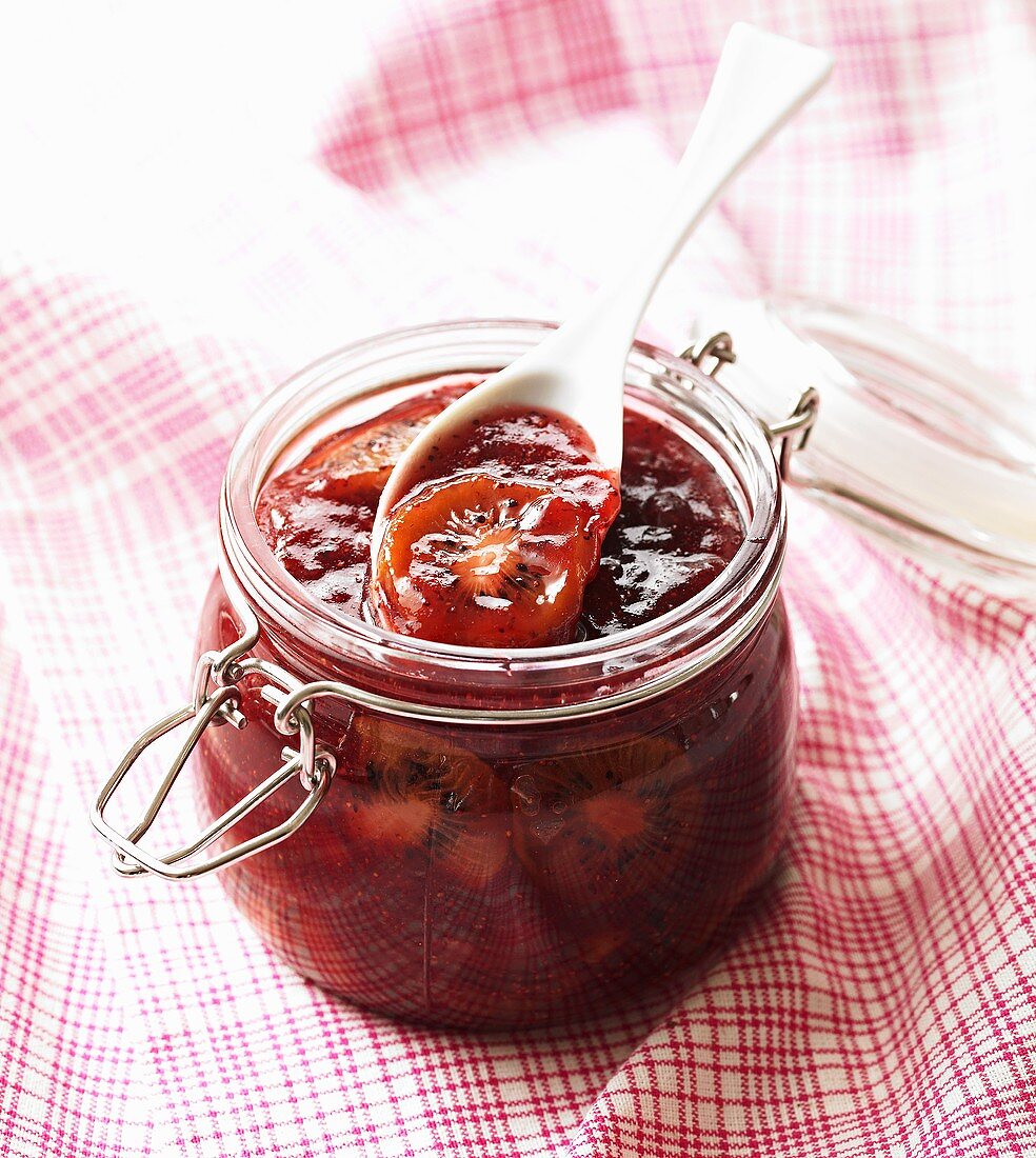 A jar of forest fruit and kiwi jam