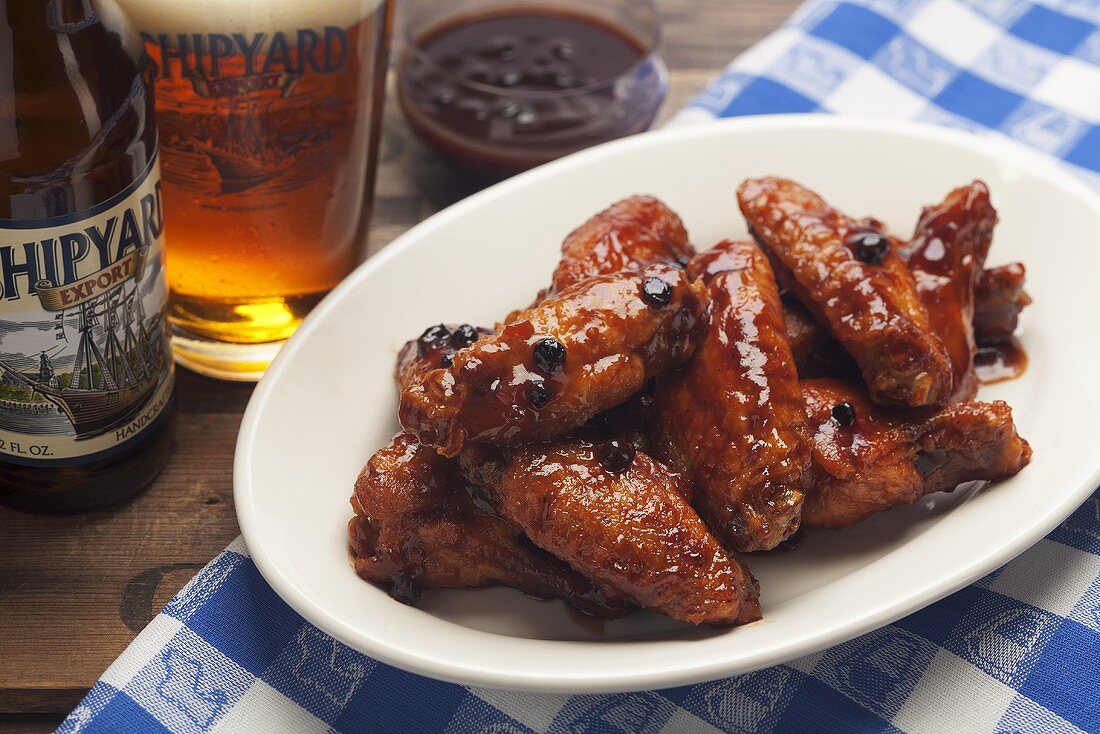 Chicken wings with sauce and beer