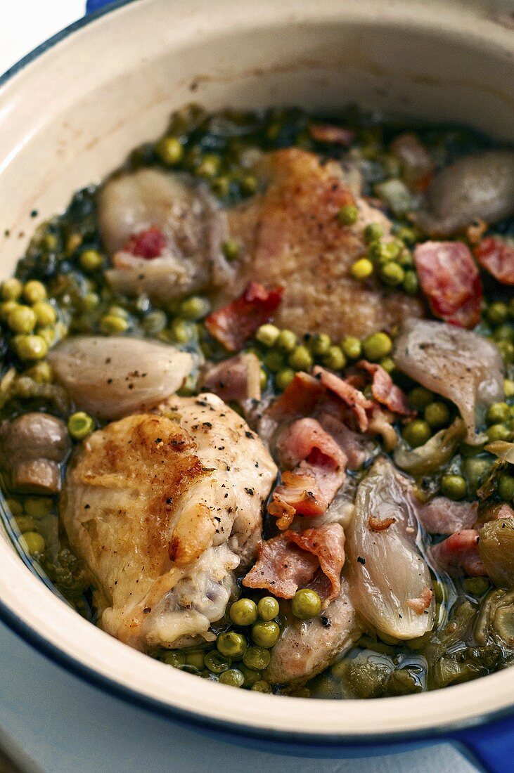 Chicken stew with peas and shallots
