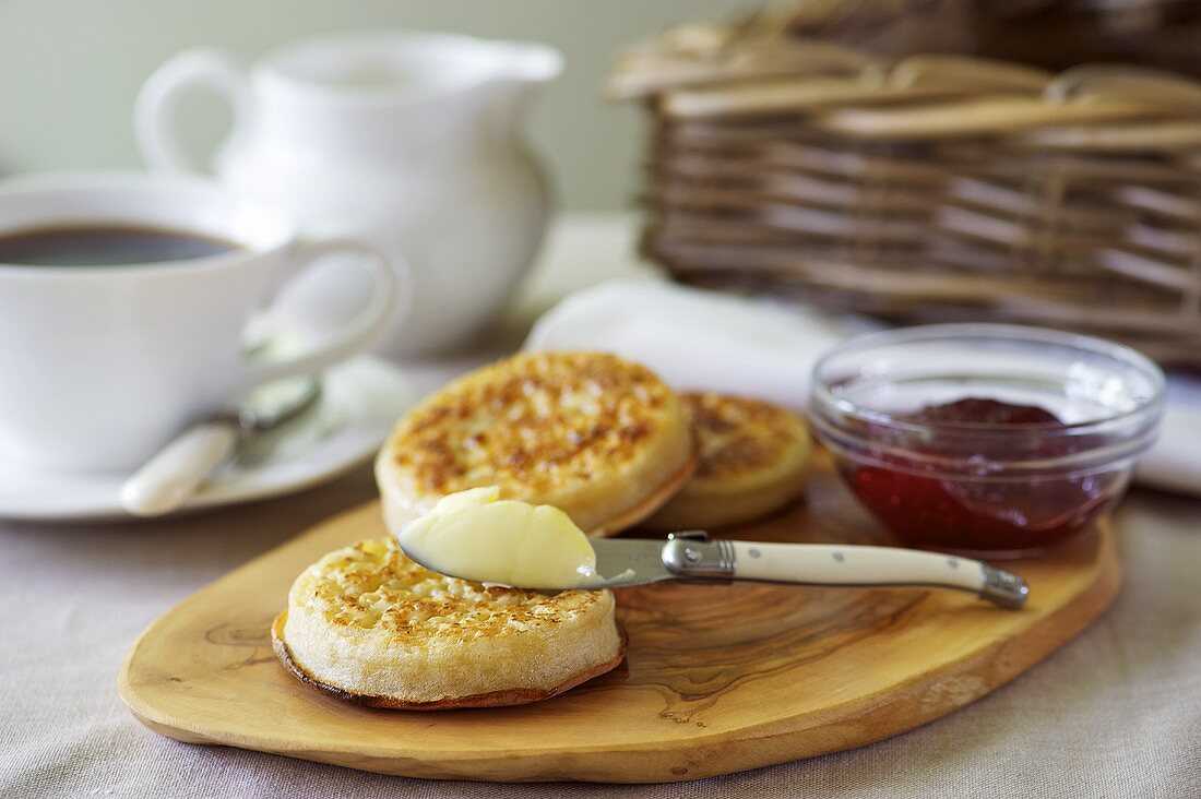 Crumpets with butter and jam