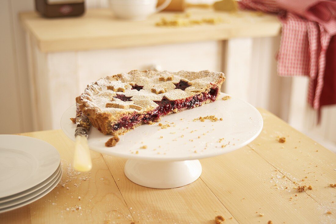 A Christmas pie on a cake stand