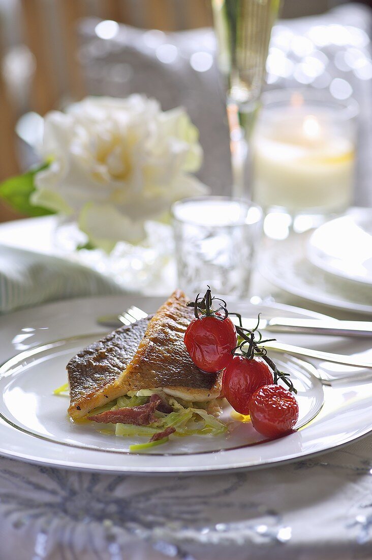 Sea bass with cherry tomatoes