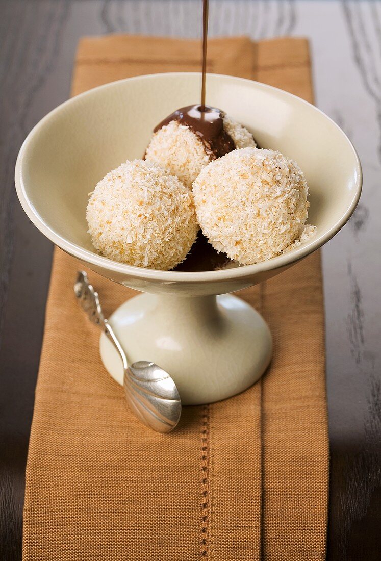 Nougat dumplings with an almond coating