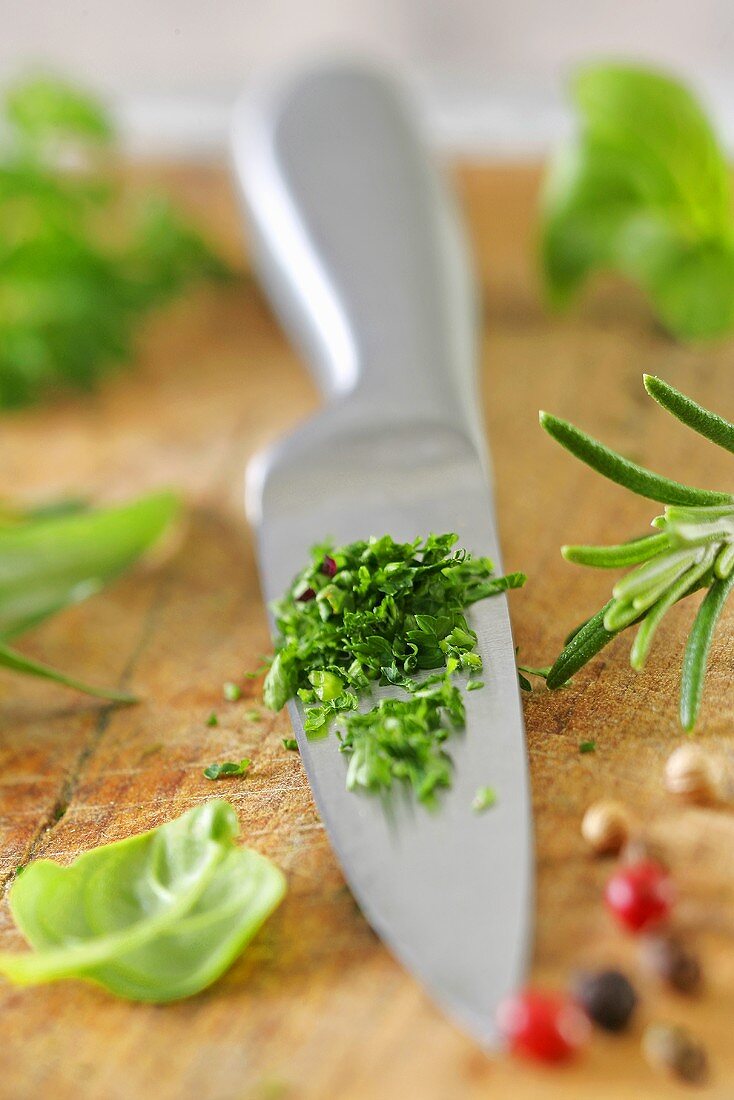 Chopped herbs on a knife