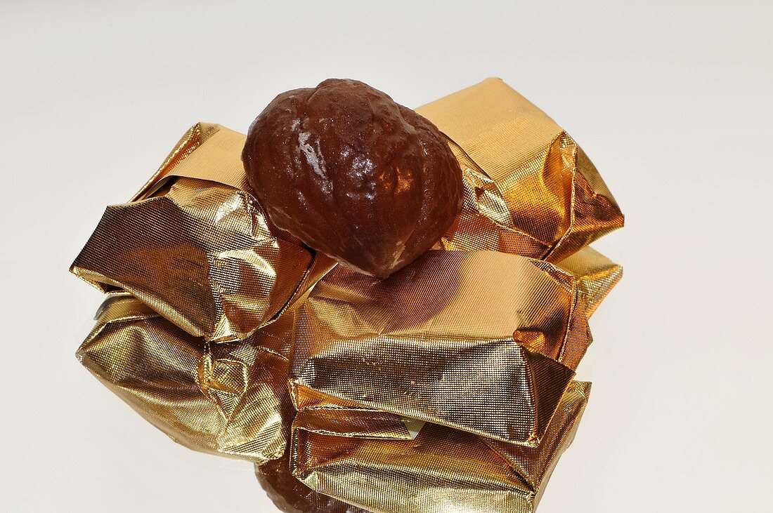 Marron glace, some wrapped in gold foil