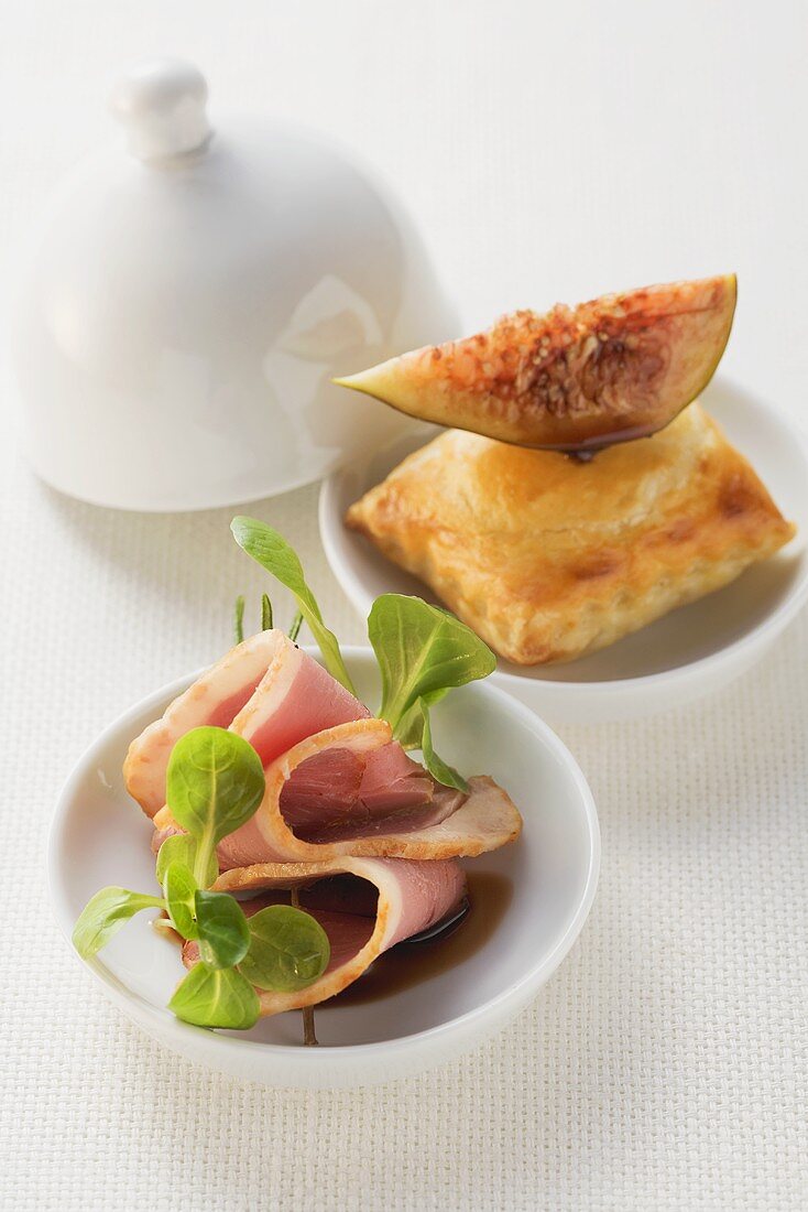 A puff pastry pocket with figs and duck breast