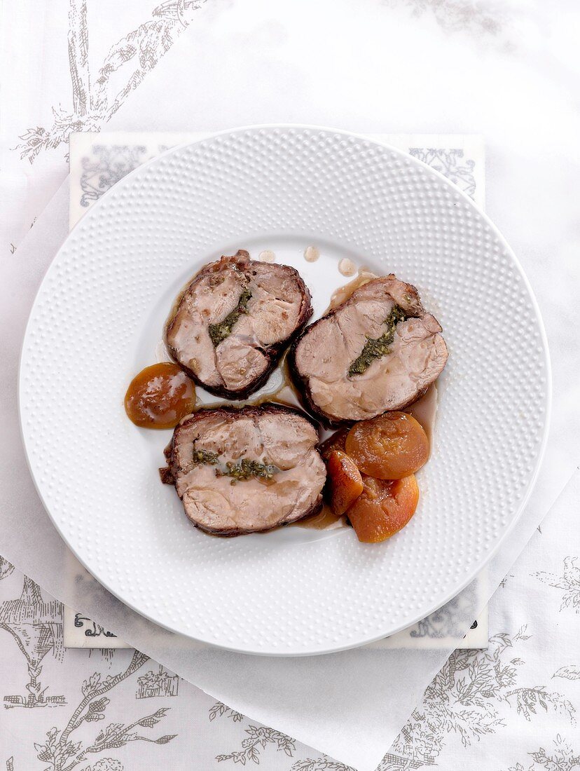 Pork roulade wrapped in ham with nectarines