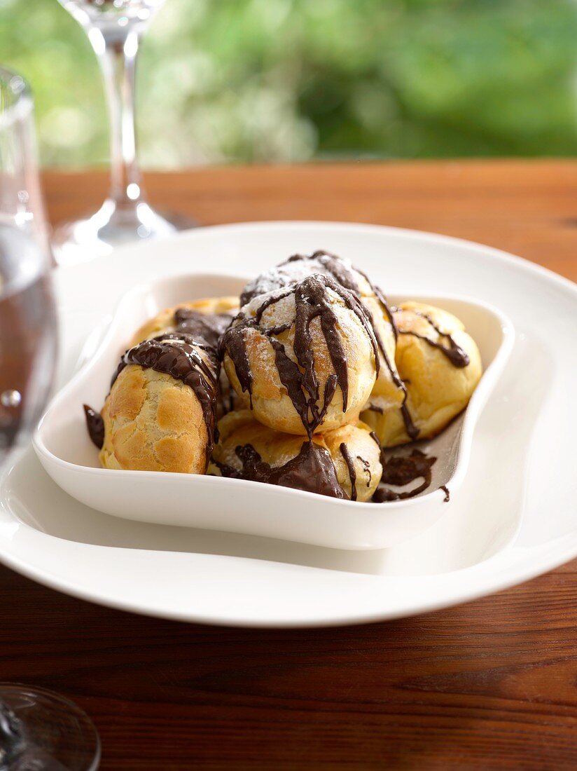 Choux pastry with chocolate sauce