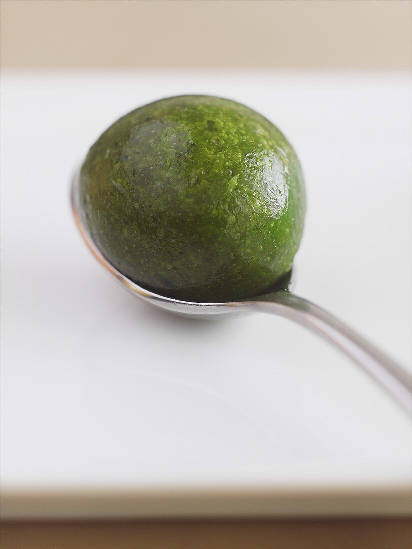 Frozen ball of herb pesto