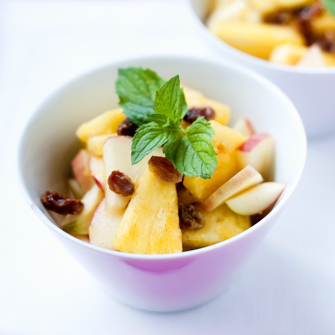 Fruit salad with raisins and mint