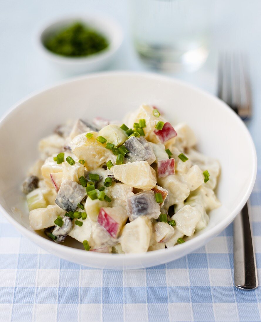 Potato, herring and apple salad with chives