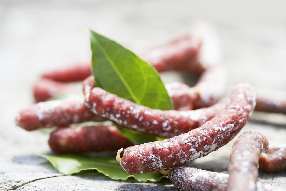 Mini-salami with bay leaves