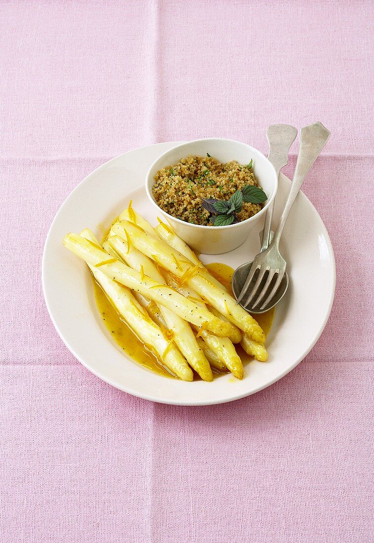 Asparagus with orange sauce and herb couscous