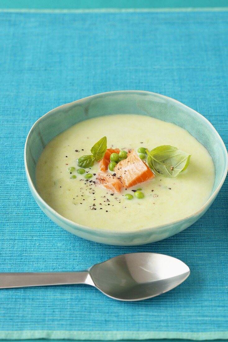 Green asparagus soup with salmon and basil