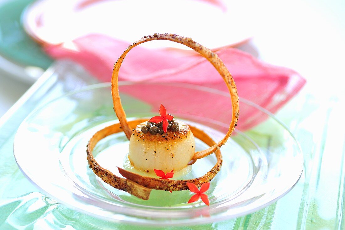 Fried scallop with truffle caviar and garlic straws